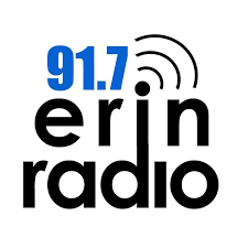 Logo of 91.7 Erin Radio with a blue number and black text on a white background